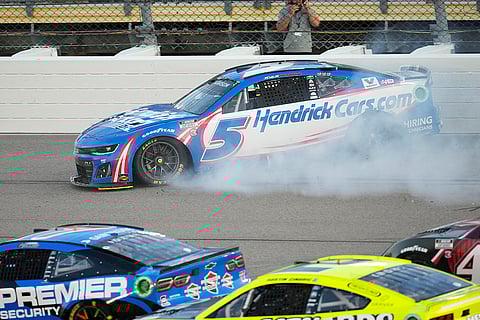 Kyle Larson (5) hits a wall during the race